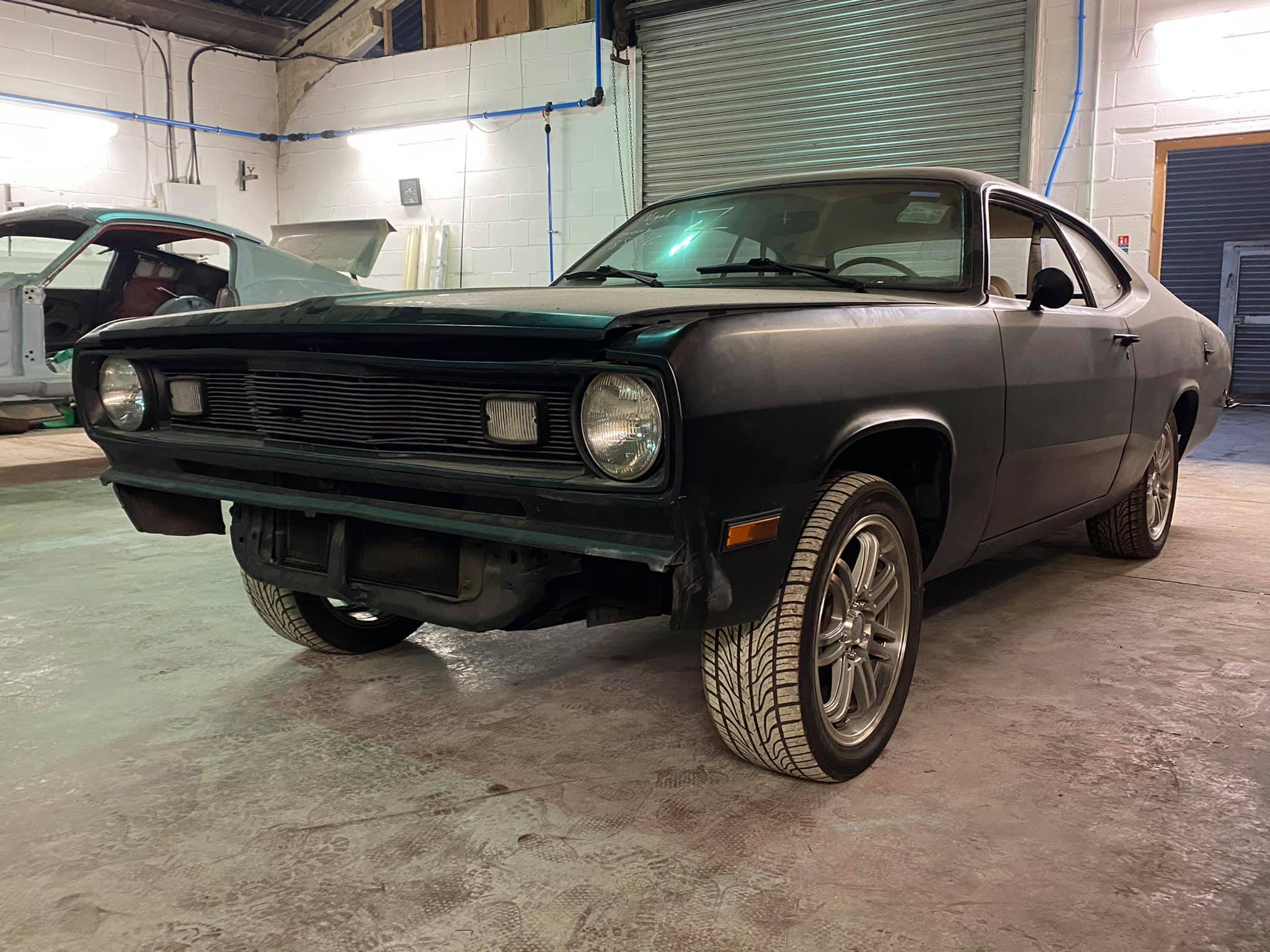 Classic car undergoing restoration in the Castle Blasting workshop